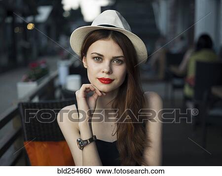 Confident Caucasian woman at sidewalk cafe View Large Photo Image Stock Image - Confident Caucasian woman at sidewalk cafe. Fotosearch