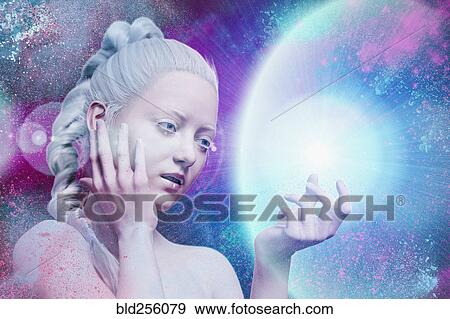 Stock Photo - Curious woman examining glowing energy. Fotosearch