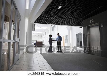 Doctor and nurse shaking hands View Large Photo Image Stock Photography - Doctor and nurse shaking hands. Fotosearch
