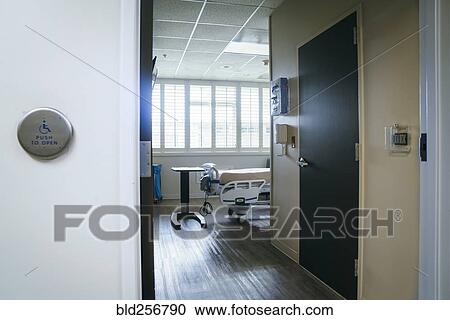 Stock Image - Doorway to an empty hospital room. Fotosearch