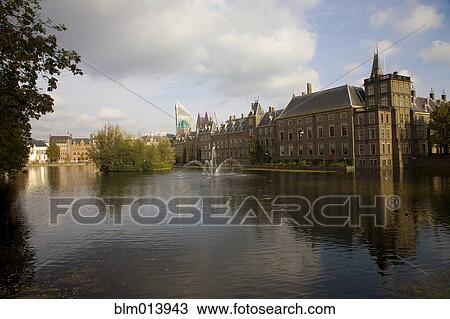 Stock Image - Dutch building on pond. Fotosearch