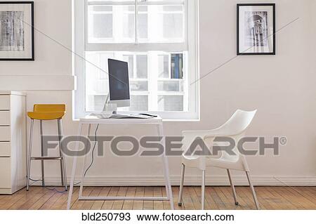 Empty chair and computer View Large Photo Image Stock Image - Empty chair and computer. Fotosearch
