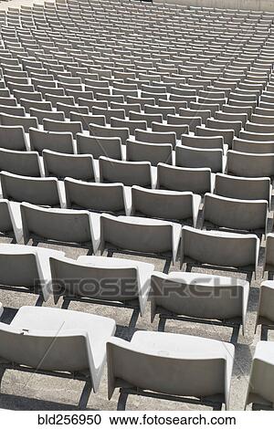 Empty chairs in stadium View Large Photo Image Stock Image - Empty chairs in stadium. Fotosearch