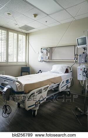 Empty hospital bed View Large Photo Image Stock Photo - Empty hospital bed. Fotosearch