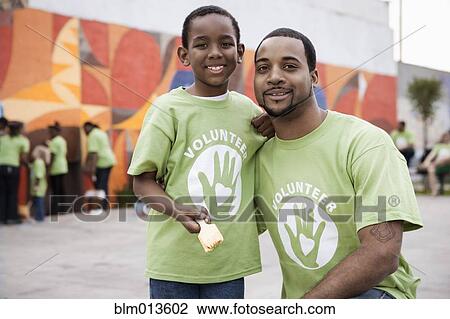 Father and son volunteering View Large Photo Image Stock Image - Father and son volunteering. Fotosearch