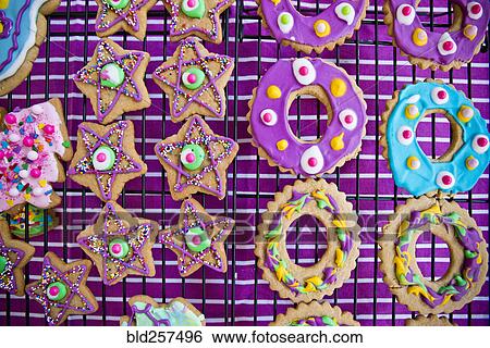 Festive Christmas cookies with multicolor icing View Large Photo Image Stock Photograph - Festive Christmas cookies with multicolor icing. Fotosearch
