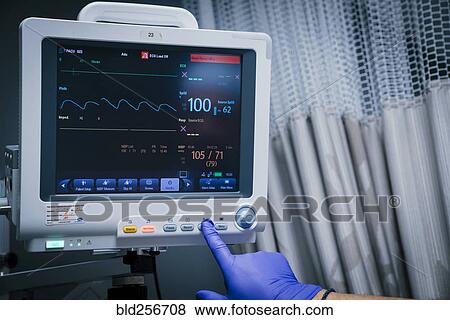 Finger of technician pressing button on monitor View Large Photo Image Stock Photo - Finger of technician pressing button on monitor. Fotosearch
