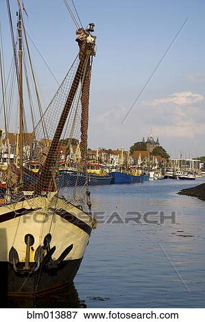 Stock Photo - Fishing boat in harbor. Fotosearch