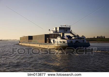 Stock Photo - Freight containers on barge. Fotosearch