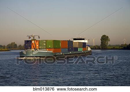 Stock Photograph - Freight containers on barge. Fotosearch