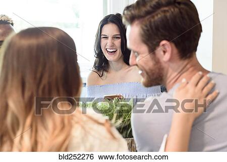 Friends laughing View Large Photo Image Stock Photograph - Friends laughing. Fotosearch