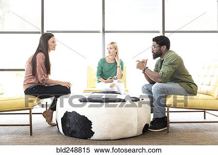 Friends talking in lounge View Large Photo Image Stock Photography - Friends talking in lounge. Fotosearch
