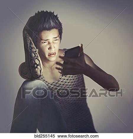 Stock Photography - Frustrated mad texting on cell phone. Fotosearch