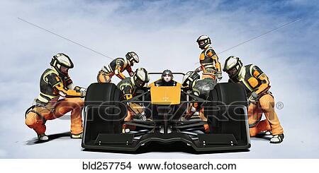 Futuristic pit crew servicing race car View Large Photo Image Picture - Futuristic pit crew servicing race car. Fotosearch