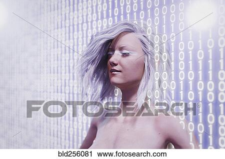 Stock Image - Futuristic woman standing in binary code wall. Fotosearch
