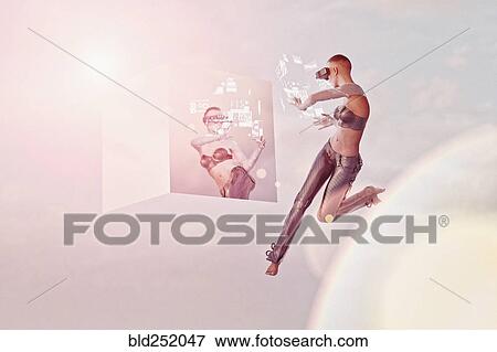 Stock Photo - Futuristic woman wearing virtual reality goggles near hologram mirror. Fotosearch