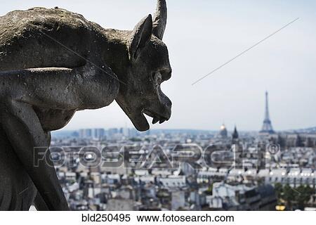Gargoyle statue overlooking cityscape View Large Photo Image Stock Photography - Gargoyle statue overlooking cityscape. Fotosearch