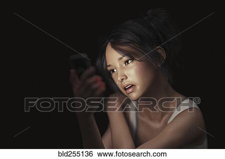 Girl texting on cell phone and crying View Large Photo Image Stock Photograph - Girl texting on cell phone and crying. Fotosearch