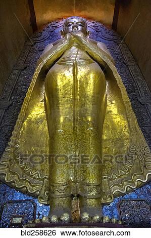Golden statue View Large Photo Image Stock Photograph - Golden statue. Fotosearch