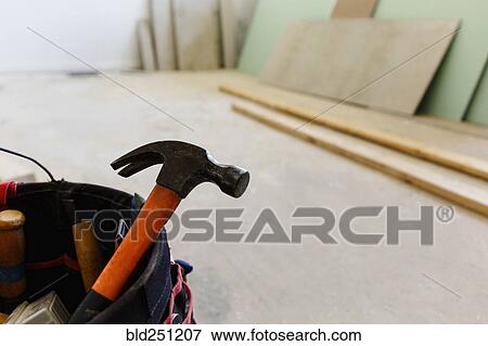 Stock Photo - Hammer in bucket. Fotosearch