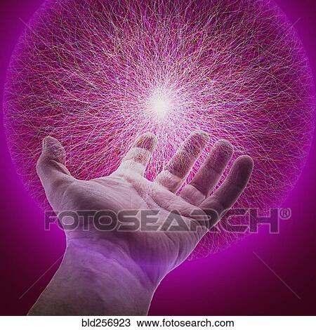 Stock Image - Hand of Caucasian man holding glowing sphere of purple energy. Fotosearch