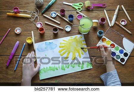 Hands of Caucasian boy painting with watercolors View Large Photo Image Stock Image - Hands of Caucasian boy painting with watercolors. Fotosearch
