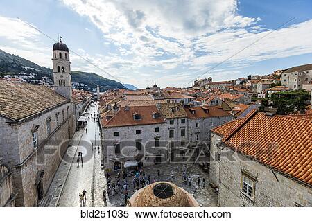 Stock Photography - High angle view of people in cityscape. Fotosearch