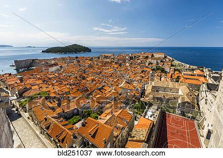 Stock Photo - High angle view of waterfront cityscape. Fotosearch