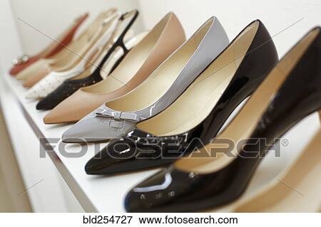 Stock Photo - High heel shoes on display. Fotosearch