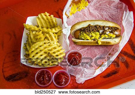 Stock Photo - Hot dog and french fries on tray. Fotosearch
