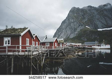 Houses at waterfront of still lake View Large Photo Image Stock Photo - Houses at waterfront of still lake. Fotosearch
