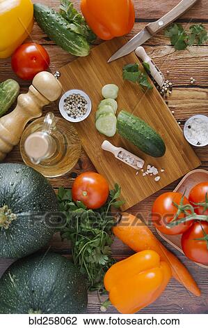 Ingredients for salad on cutting board View Large Photo Image Stock Image - Ingredients for salad on cutting board. Fotosearch