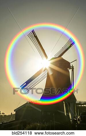 Stock Photo - Lens flare around windmill. Fotosearch
