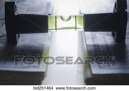Level stacks of money View Large Photo Image Picture - Level stacks of money. Fotosearch