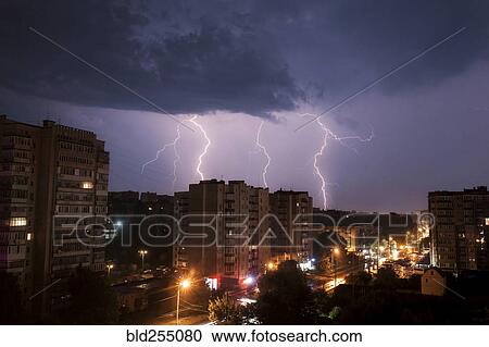 Stock Image - Lightning over city at night. Fotosearch