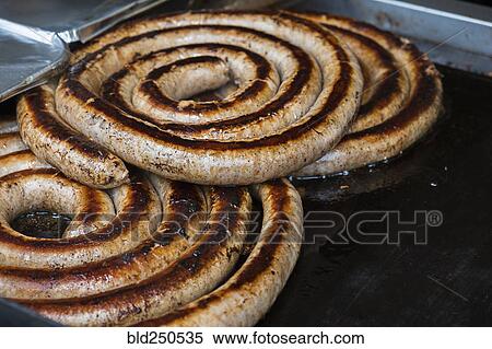 Links of meat cooking on grille View Large Photo Image Stock Photography - Links of meat cooking on grille. Fotosearch