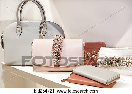 Stock Image - Luxury purses on display. Fotosearch