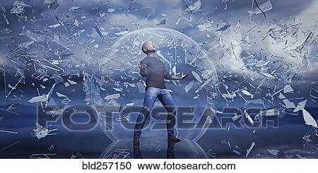Stock Image - Man standing in sphere protected from falling shards of glass. Fotosearch