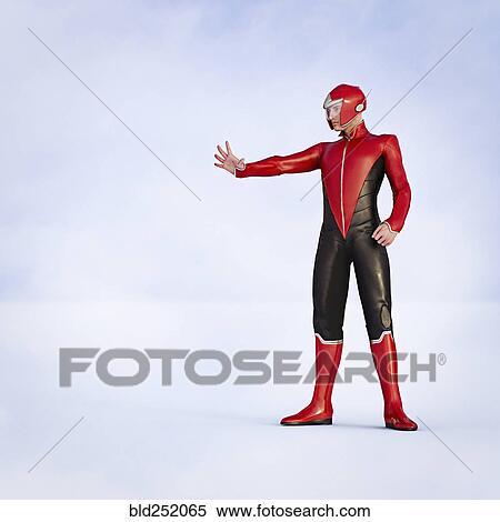 Stock Photography - Man wearing superhero costumes gesturing stop. Fotosearch