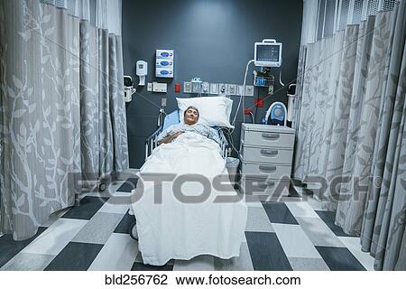 Mixed race patient sleeping in hospital bed View Large Photo Image Stock Image - Mixed race patient sleeping in hospital bed. Fotosearch