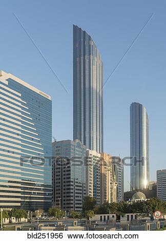 Stock Photograph - Modern highrises in city. Fotosearch