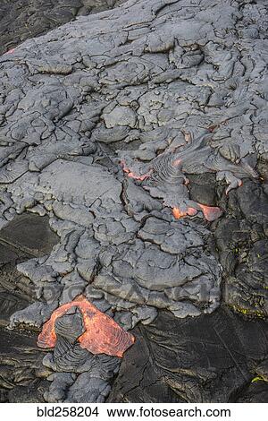 Molten lava glowing near dried lava View Large Photo Image Picture - Molten lava glowing near dried lava. Fotosearch