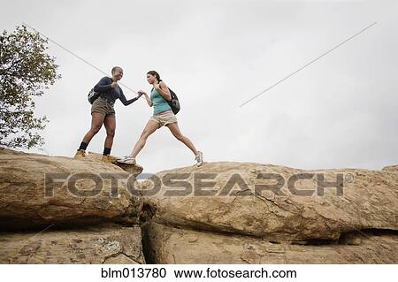 Mother and daughter hiking together View Large Photo Image Stock Image - Mother and daughter hiking together. Fotosearch