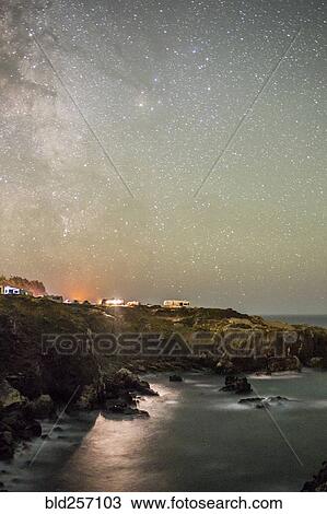 Night sky over cliff at ocean View Large Photo Image Stock Image - Night sky over cliff at ocean. Fotosearch