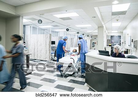 Stock Photo - Nurses station in busy hospital. Fotosearch