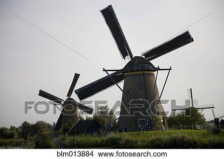 Picture - Old-fashioned Dutch windmills. Fotosearch