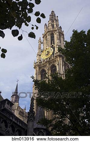 Stock Photograph - Ornate clock tower of cathedral. Fotosearch