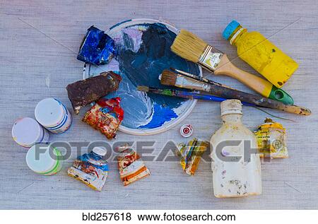 Painting supplies on table View Large Photo Image Stock Photo - Painting supplies on table. Fotosearch