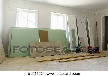 Panels and doors leaning on wall View Large Photo Image Picture - Panels and doors leaning on wall. Fotosearch