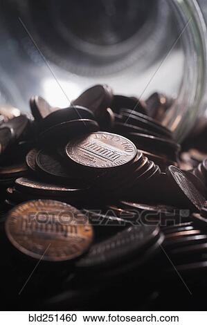 Pile of pennies near jar View Large Photo Image Stock Image - Pile of pennies near jar. Fotosearch